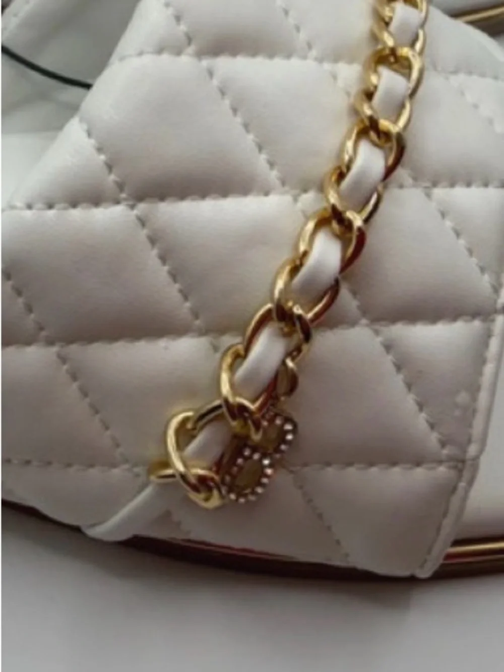 bebe White Quilted Slide Sandals with Gold Chain Accent